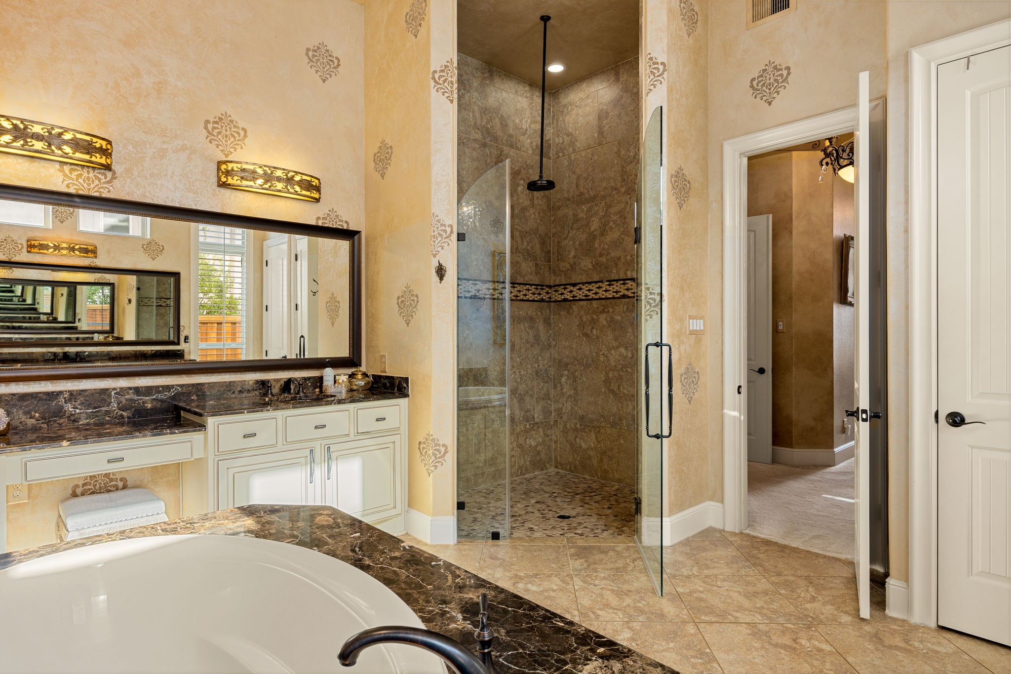 26515 Ashley Ridge Lane Katy, TX 77494 - Photo 27 of 50 a bathroom with a shower sink and mirror