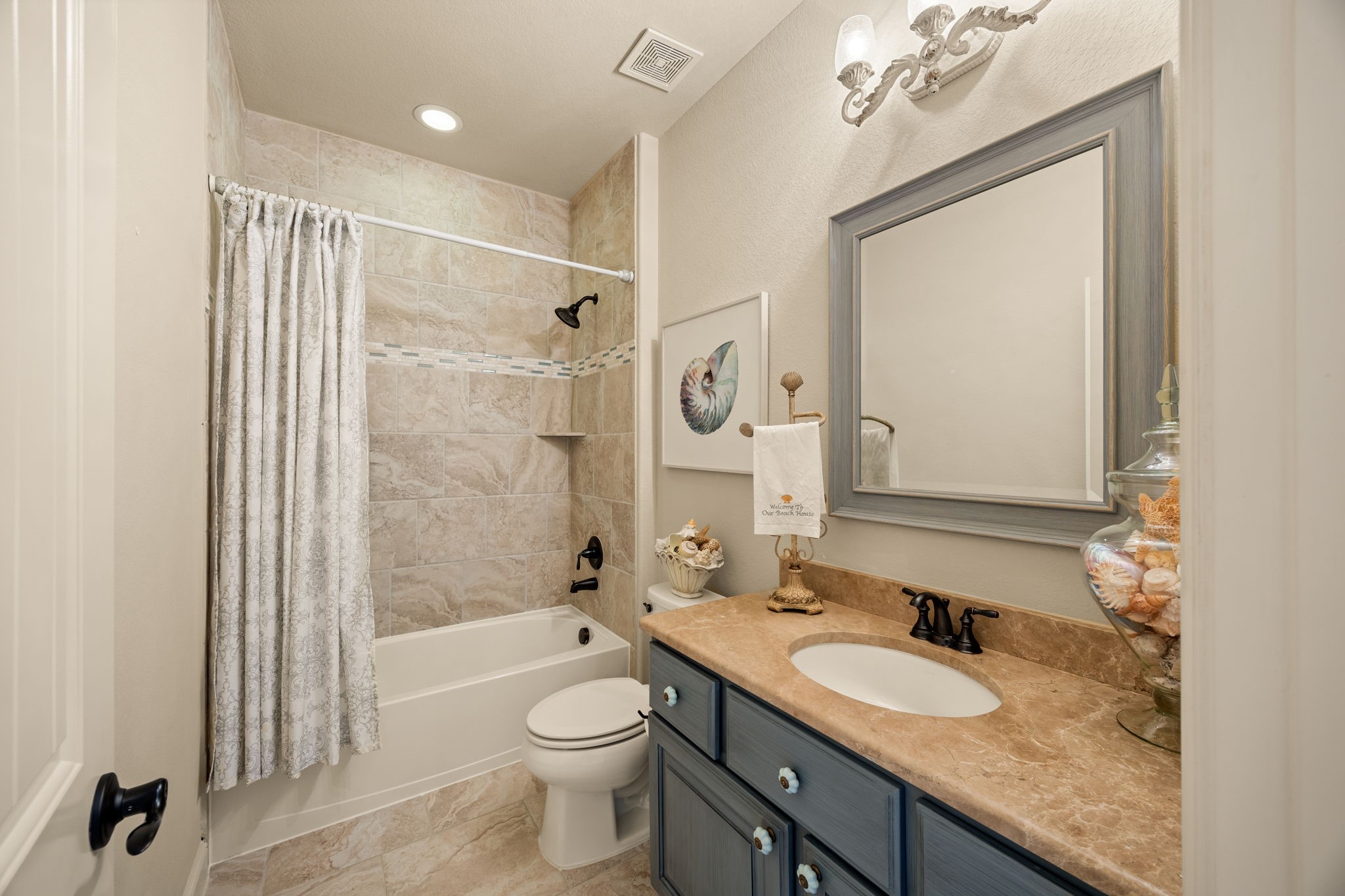 26515 Ashley Ridge Lane Katy, TX 77494 - Photo 35 of 50 a bathroom with a granite countertop sink toilet mirror and shower