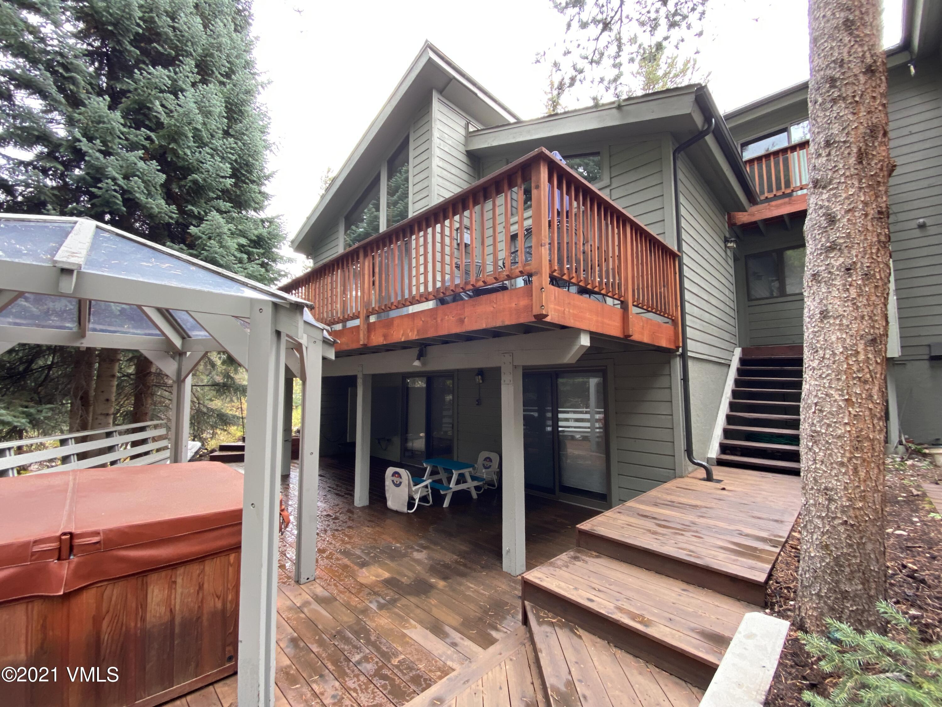4484 Streamside Circle Vail, CO 81657 - Photo 4 of 29 a view of a house with a patio