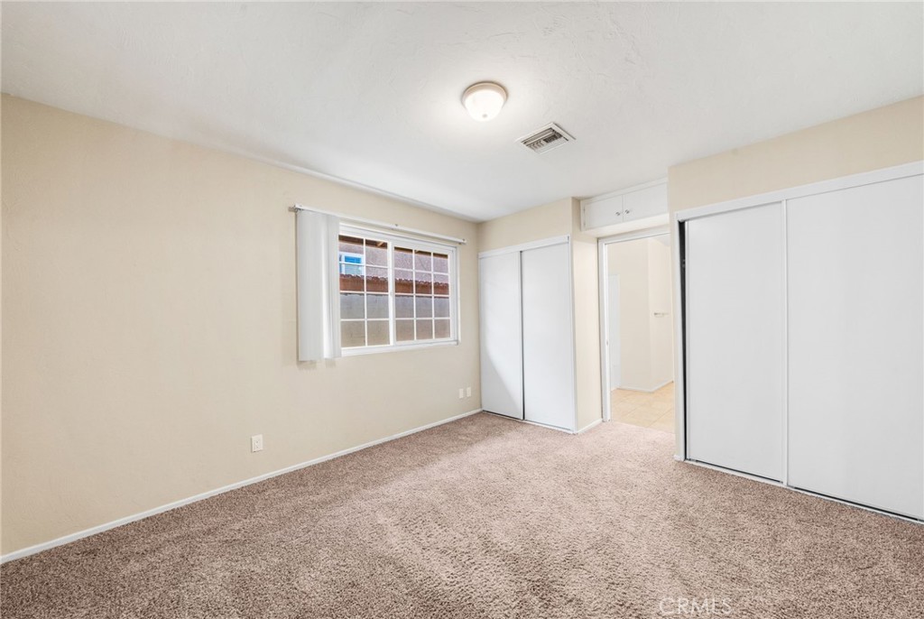 37310 Populus Avenue Palmdale, CA 93552 - Photo 16 of 28 an empty room with windows