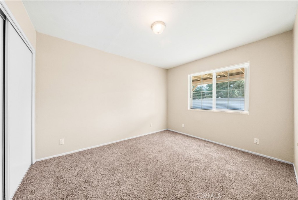 37310 Populus Avenue Palmdale, CA 93552 - Photo 21 of 28 an empty room with windows