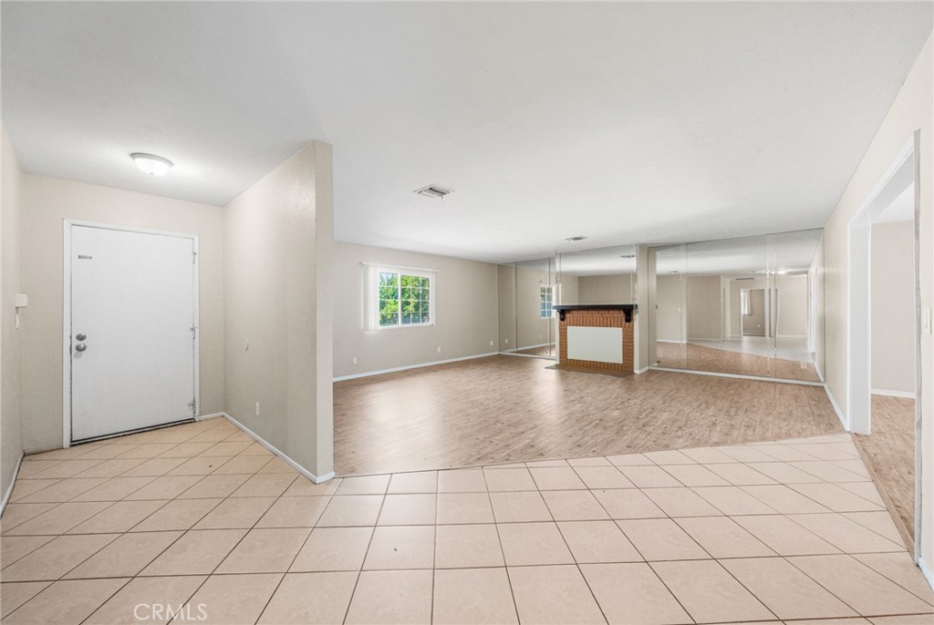 37310 Populus Avenue Palmdale, CA 93552 - Photo 4 of 28 a view of an empty room and window