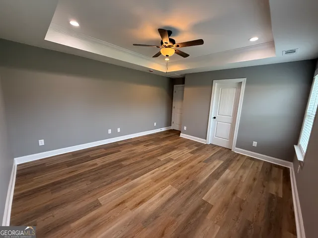 a view of a room with a hallway