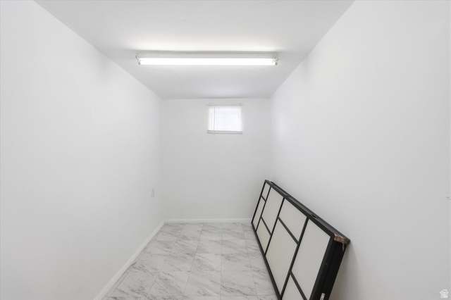 676 South 500 West Provo, UT 84601 - Photo 21 of 29 Empty room with light marble finish floors and baseboards