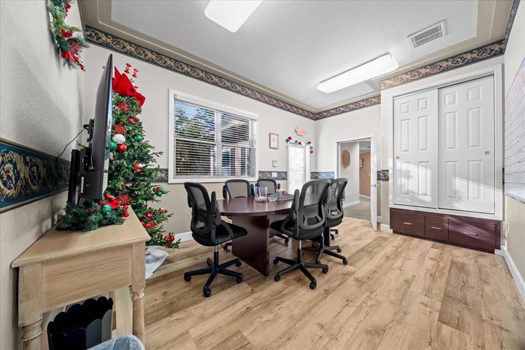 434 Southwest 14th Street, Unit A Ocala, FL 34471 - Photo 53 of 100 a view of a dining room with furniture window and wooden floor