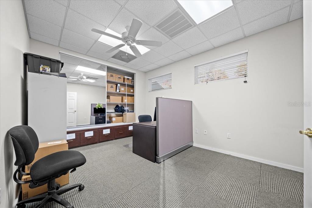 434 Southwest 14th Street, Unit A Ocala, FL 34471 - Photo 54 of 100 a living room with furniture and a wooden floor