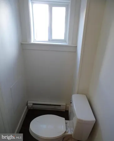 a bathroom with a toilet