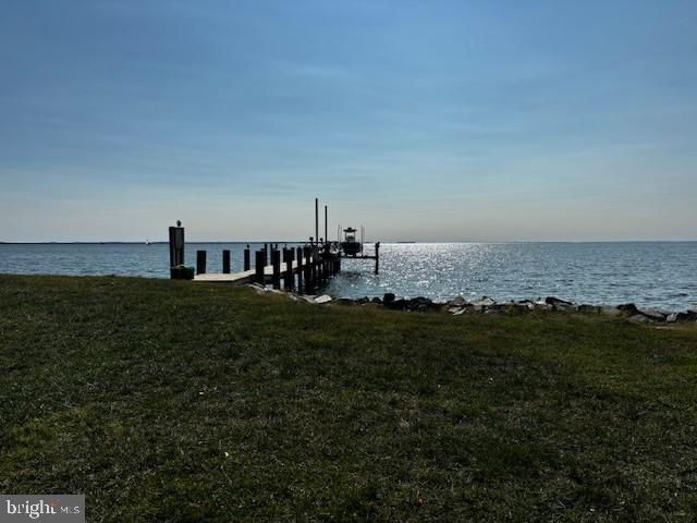 4480 Bachelors Point Road Oxford, MD 21654 - Photo 2 of 12 a front view of a house with a garden