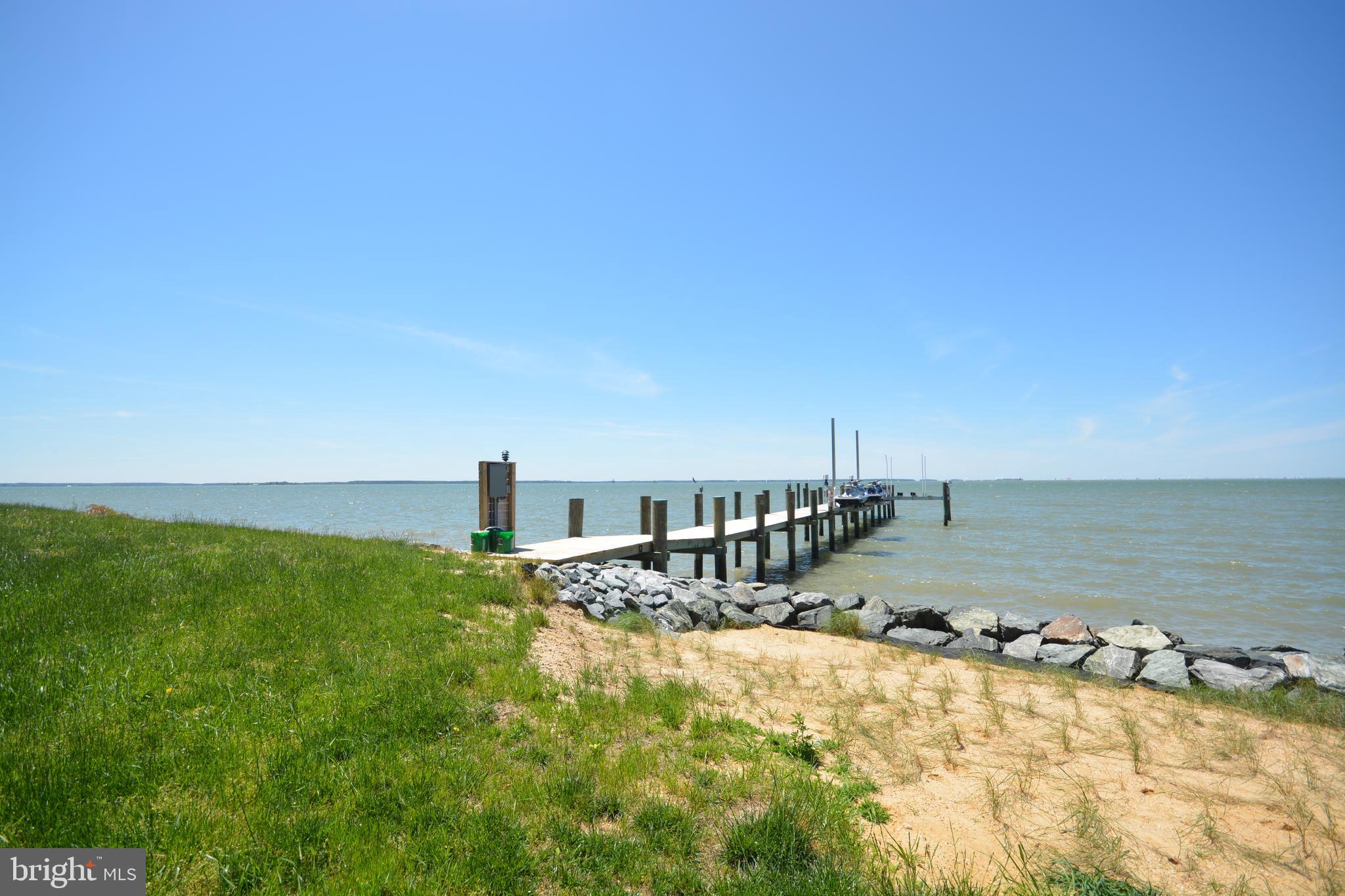 4480 Bachelors Point Road Oxford, MD 21654 - Photo 8 of 12 a view of a water with a big yard
