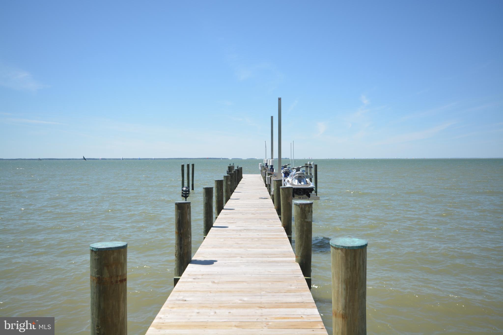 4480 Bachelors Point Road Oxford, MD 21654 - Photo 9 of 12 a wooden pier with a view of lake