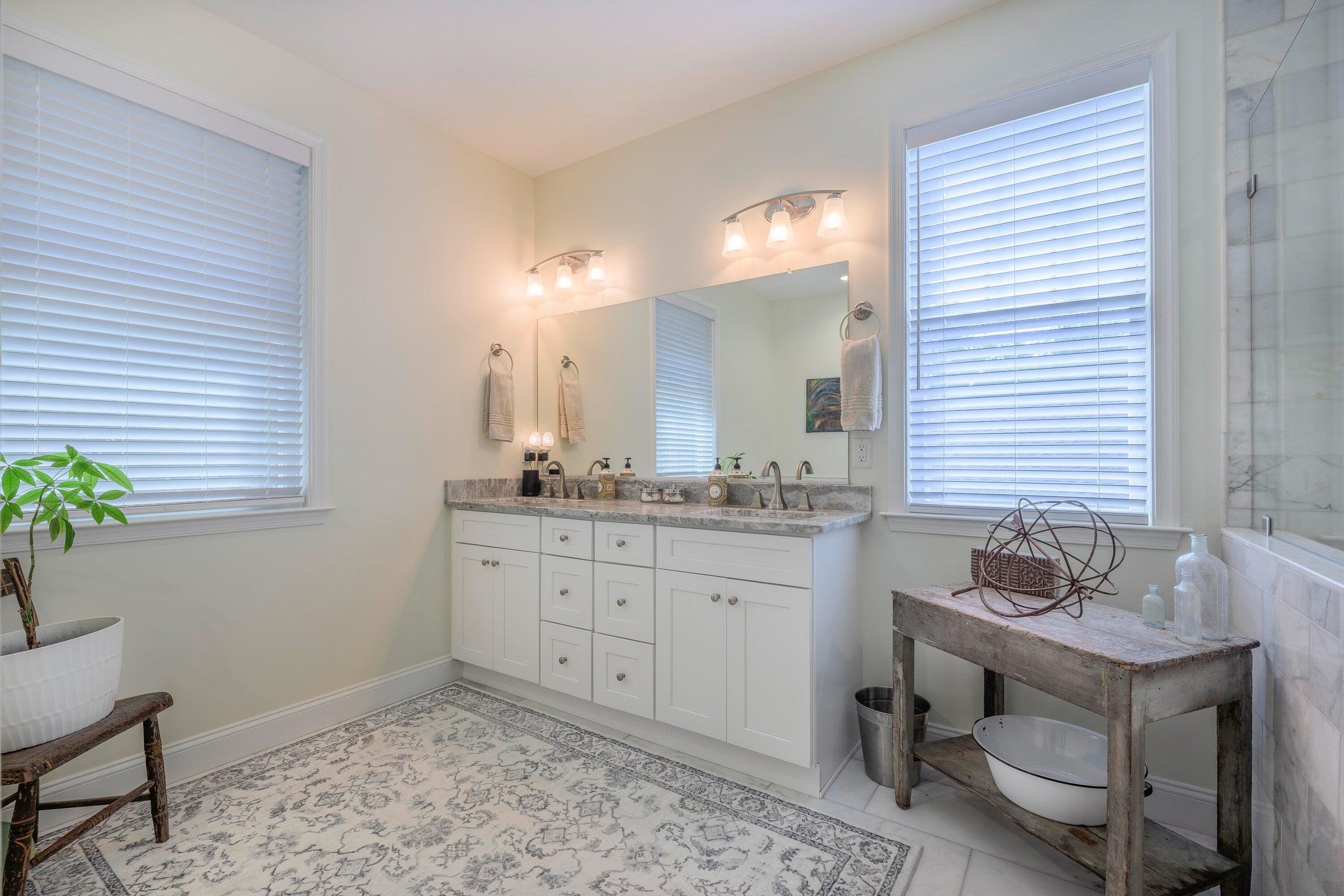 43 Chamberlain Loop Lexington, VA 24450 - Photo 36 of 47 The well-appointed primary bath complete with double vanities, soaking tub, and a frameless glass spa-style shower