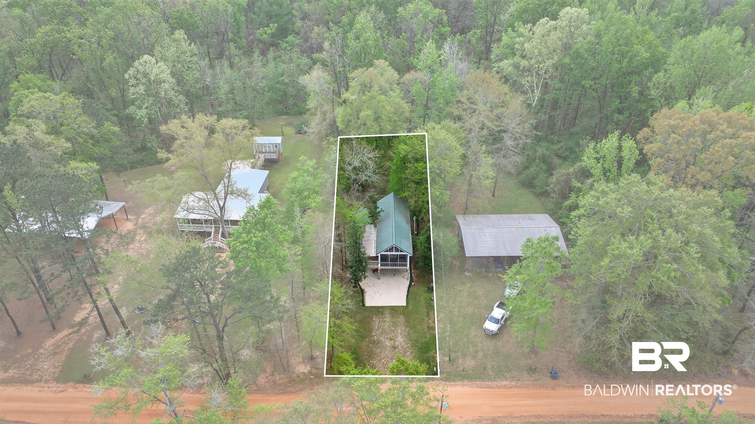 3983 Eureka Landing Road Uriah, AL 36480 - Photo 45 of 45 Aerial view of property and surrounding area with property parcel outlined and a forest
