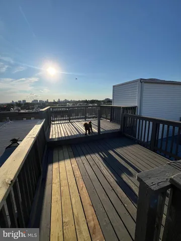 a view of balcony with furniture