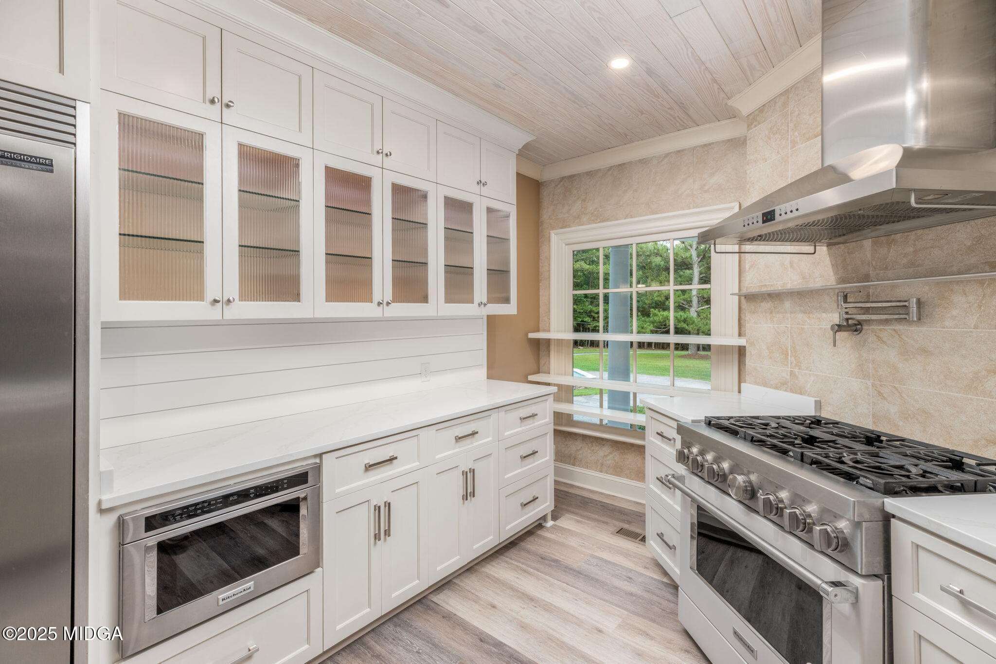 7335 Colaparchee Road Macon, GA 31220 - Photo 14 of 49 a kitchen with granite countertop a stove and a sink