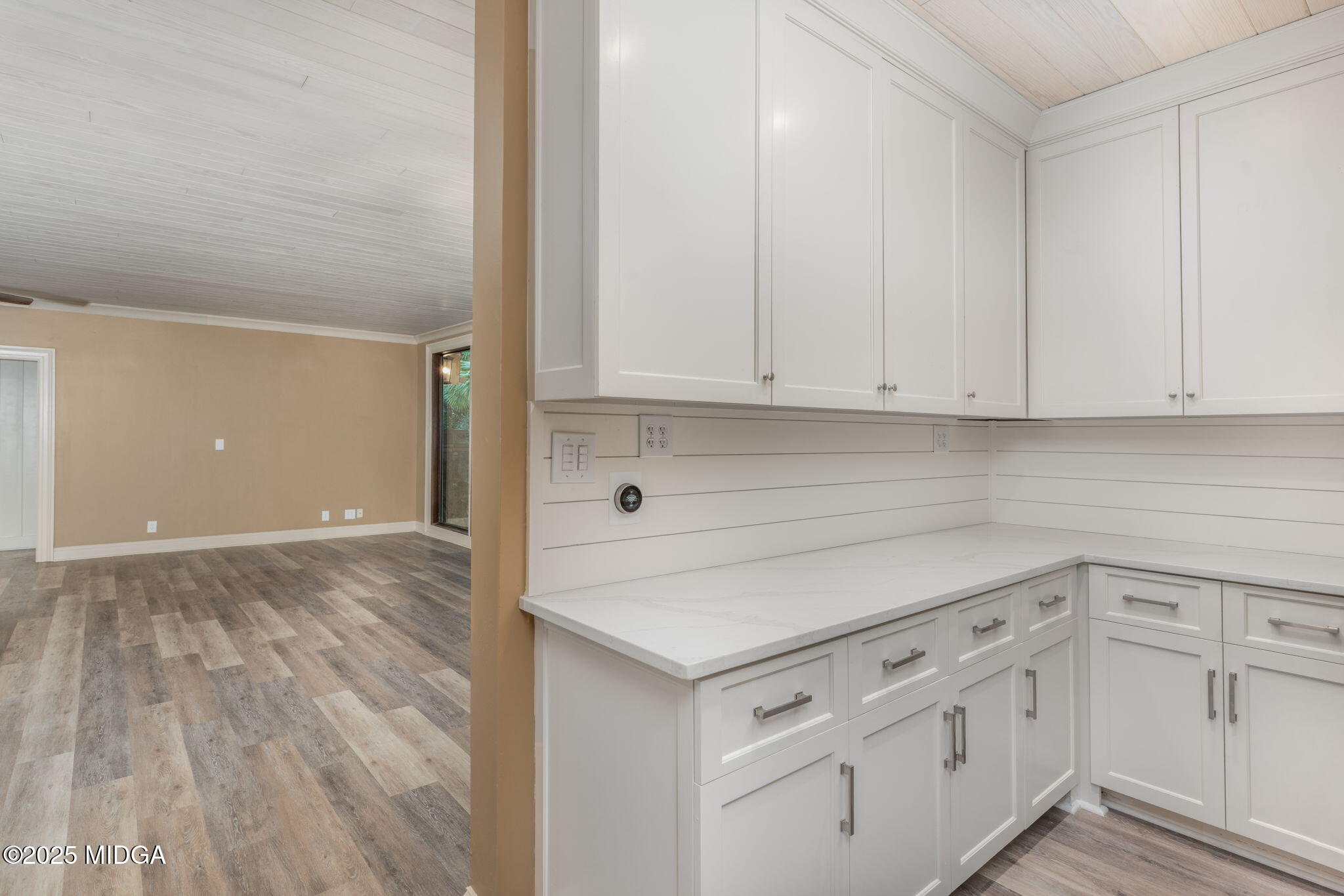 7335 Colaparchee Road Macon, GA 31220 - Photo 16 of 49 a view of a kitchen with white cabinets