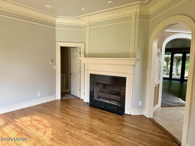 7335 Colaparchee Road Macon, GA 31220 - Photo 20 of 49 a view of empty room with fireplace and wooden floor