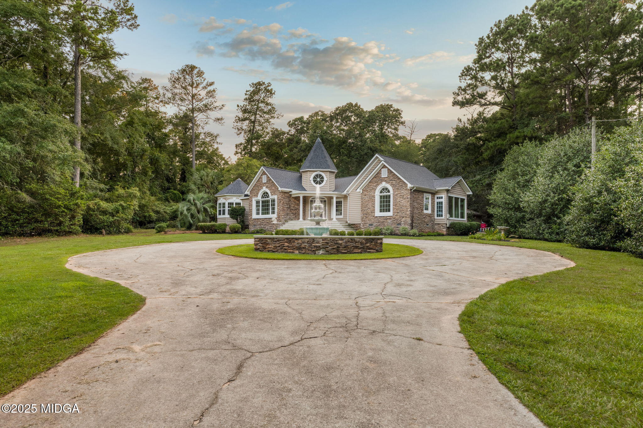 7335 Colaparchee Road Macon, GA 31220 - Photo 2 of 49 a view of house with yard and green space