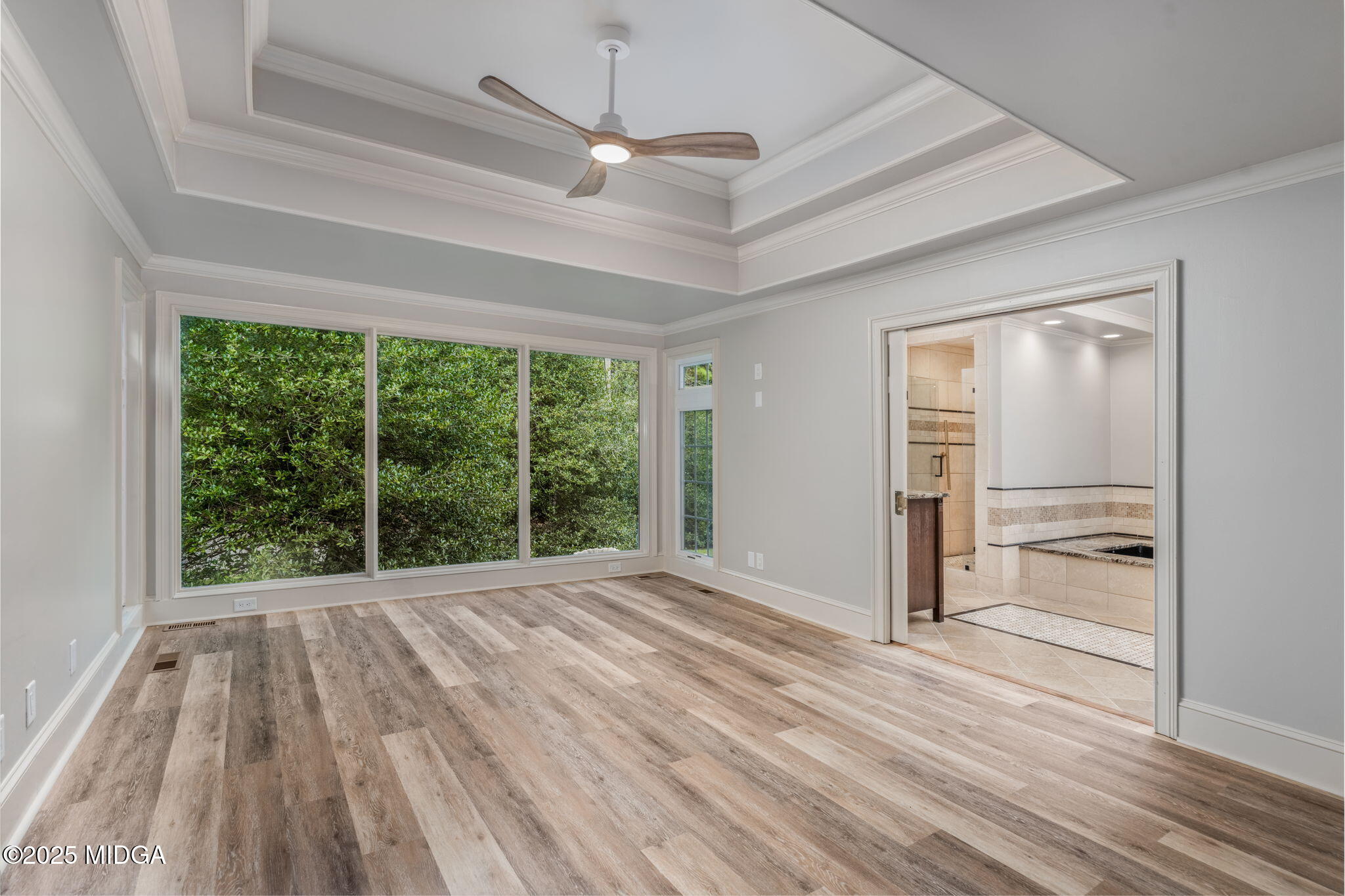 7335 Colaparchee Road Macon, GA 31220 - Photo 21 of 49 a view of empty room with wooden floor and fan