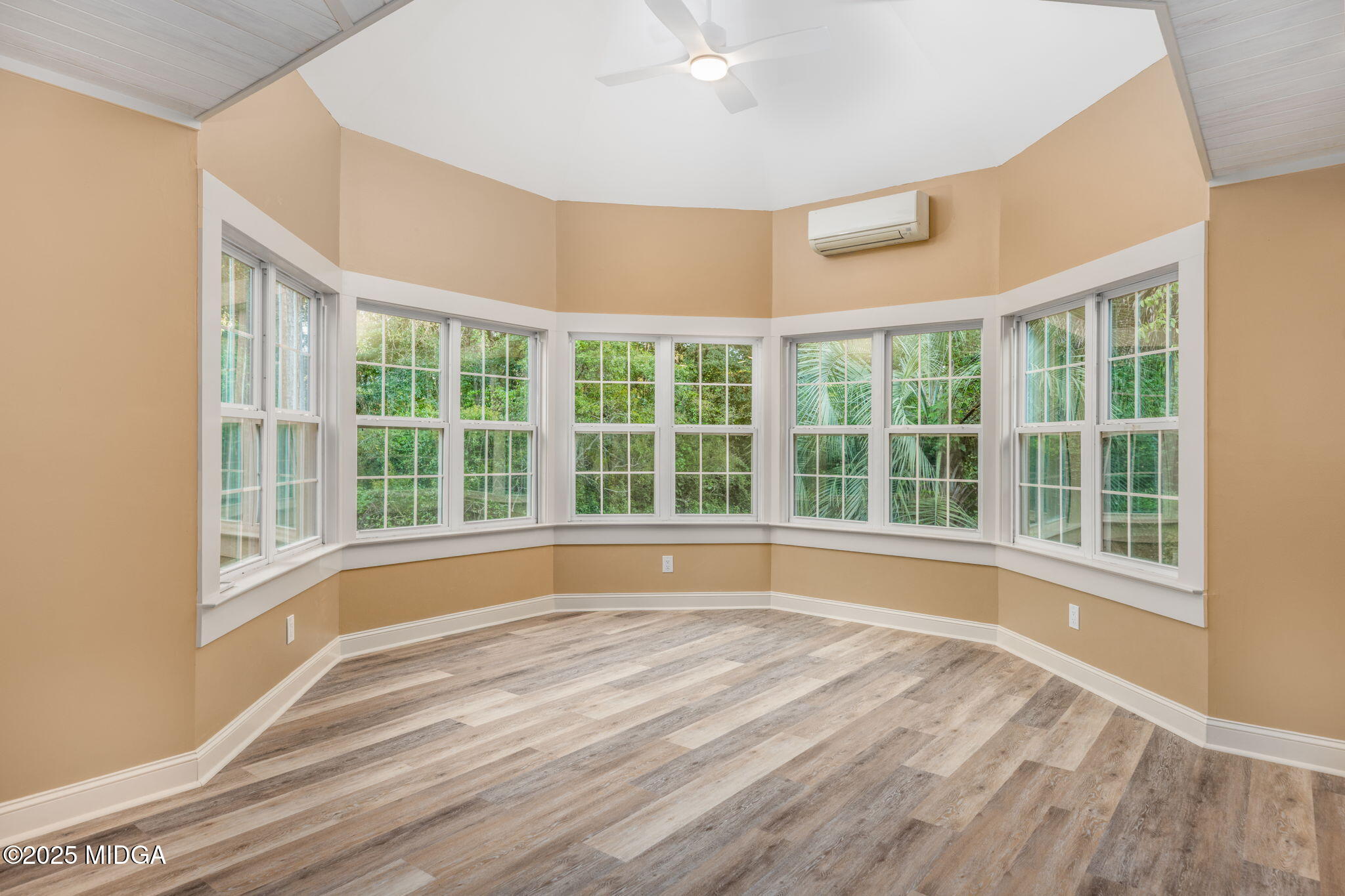 7335 Colaparchee Road Macon, GA 31220 - Photo 33 of 49 a view of empty room with wooden floor and fan