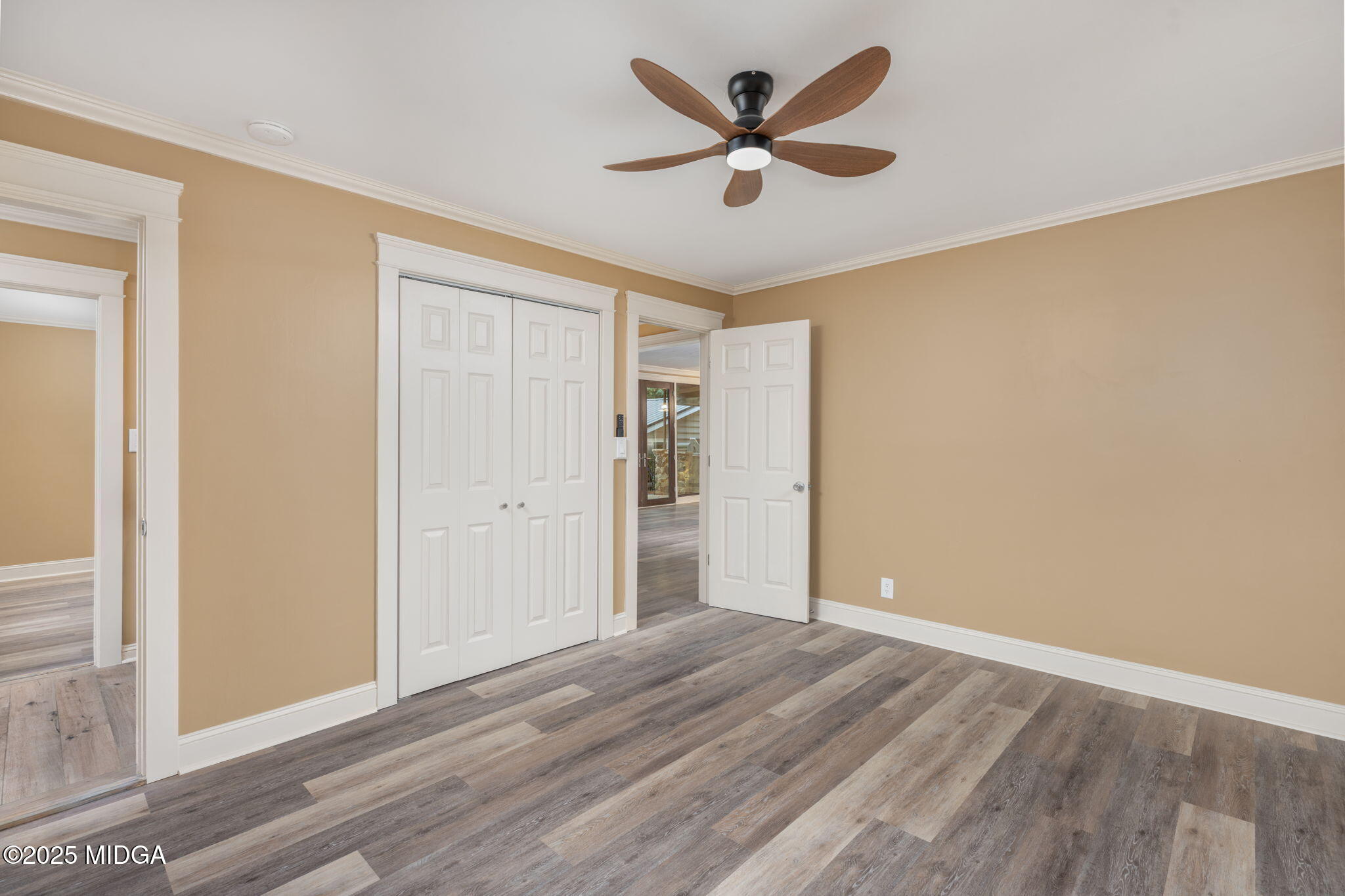 7335 Colaparchee Road Macon, GA 31220 - Photo 35 of 49 a view of a big room with wooden floor and windows
