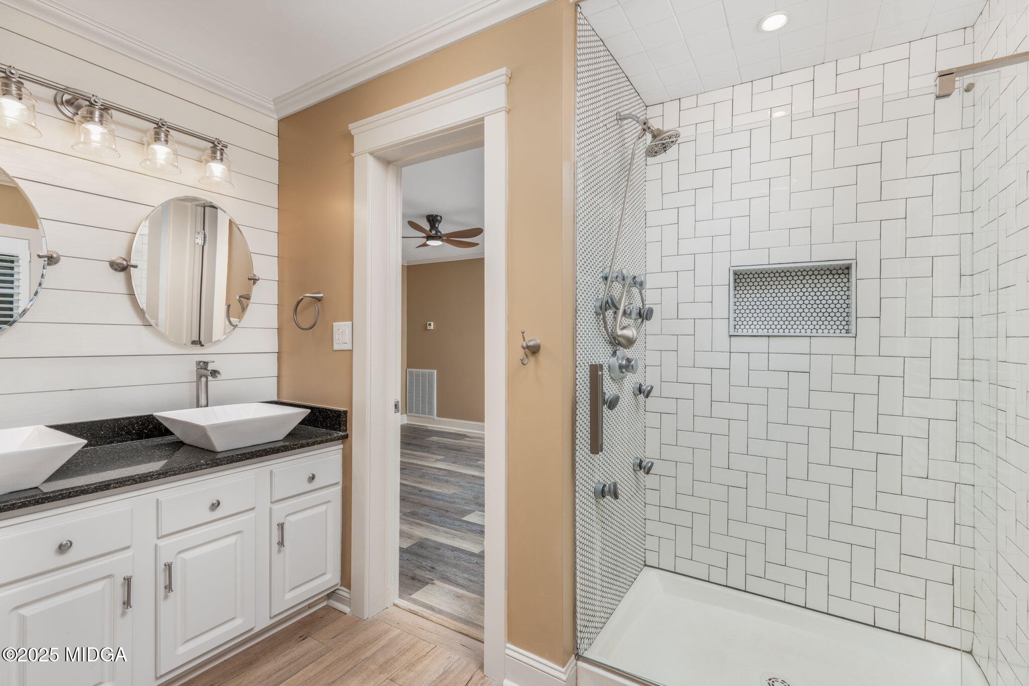 7335 Colaparchee Road Macon, GA 31220 - Photo 39 of 49 a bathroom with a granite countertop sink a shower and a mirror