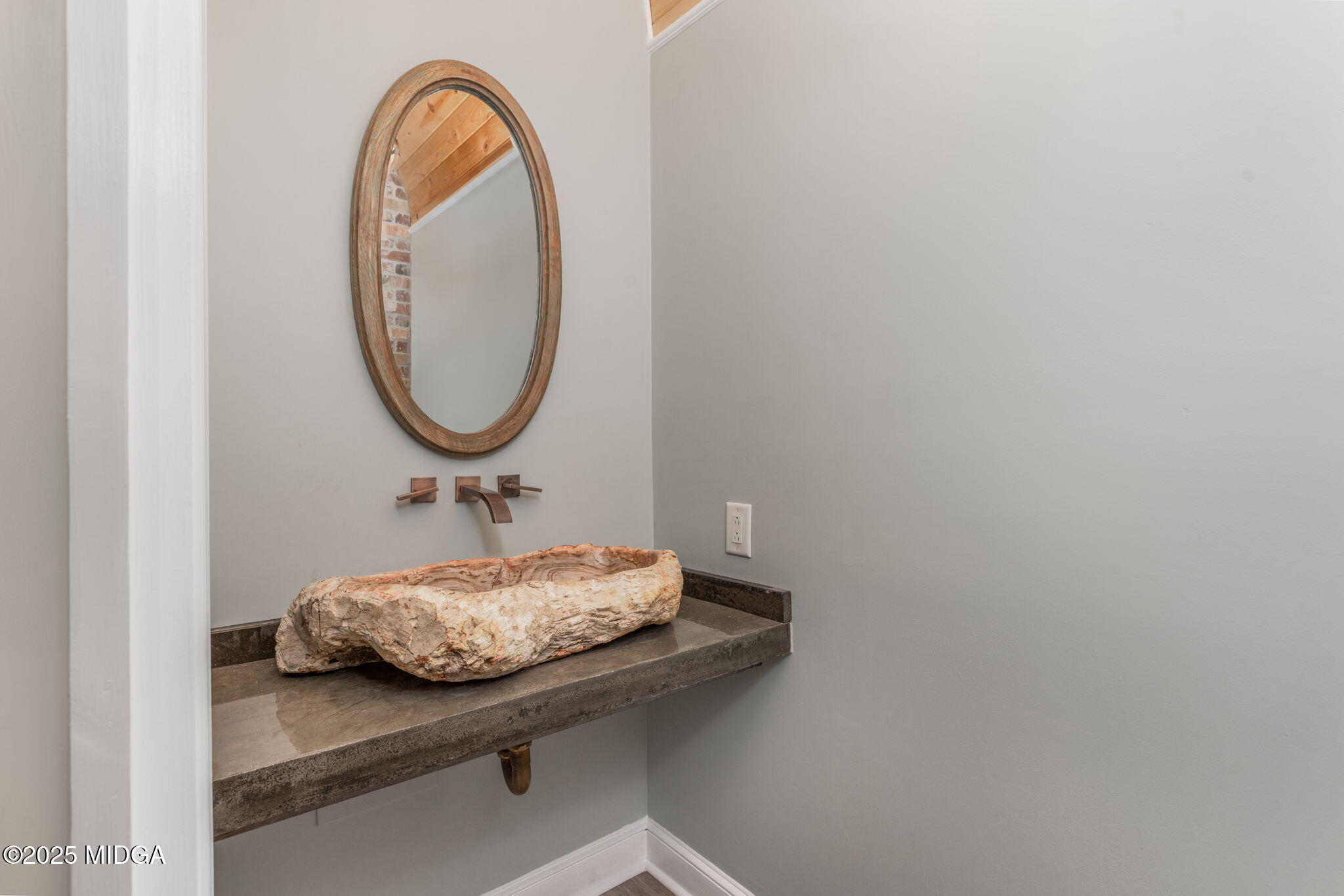 7335 Colaparchee Road Macon, GA 31220 - Photo 41 of 49 a bathroom with a sink and a mirror