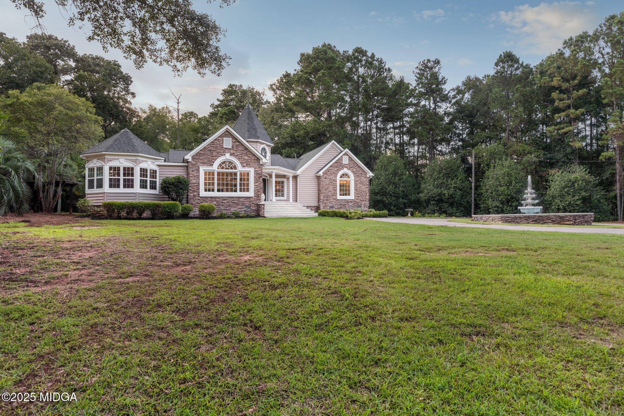 7335 Colaparchee Road Macon, GA 31220 - Photo 5 of 49 a front view of a house with a yard