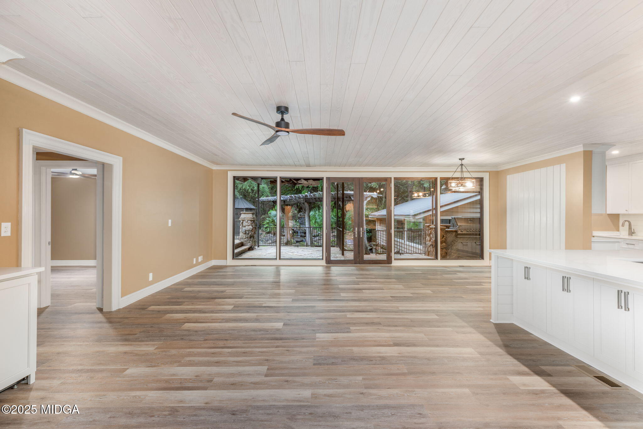 7335 Colaparchee Road Macon, GA 31220 - Photo 8 of 49 a view of an empty room with window and wooden floor