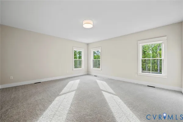an empty room with windows