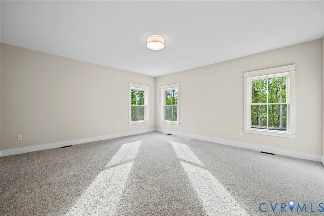 4-2 Old Telegraph Road Providence Forge, VA 23140 - Photo 23 of 32 an empty room with windows