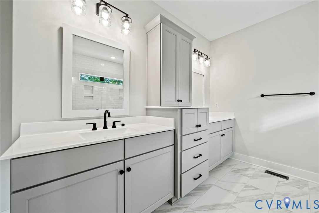 4-2 Old Telegraph Road Providence Forge, VA 23140 - Photo 26 of 32 a bathroom with a sink and a mirror