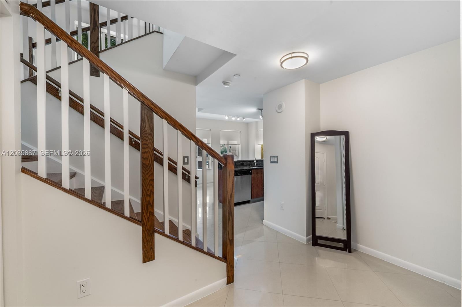 7375 Southwest 90th Street, Unit TH107 Miami, FL 33156 - Photo 7 of 18 Foyer from Lobby Entrance