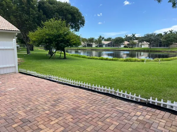 a garden view with a lake view
