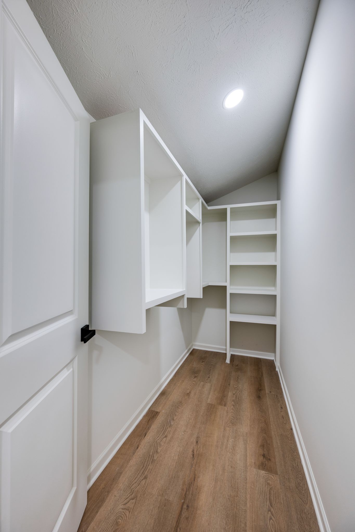 312 Bluebird Lane Dickson, TN 37055 - Photo 15 of 25 a view of walk in closet with empty racks