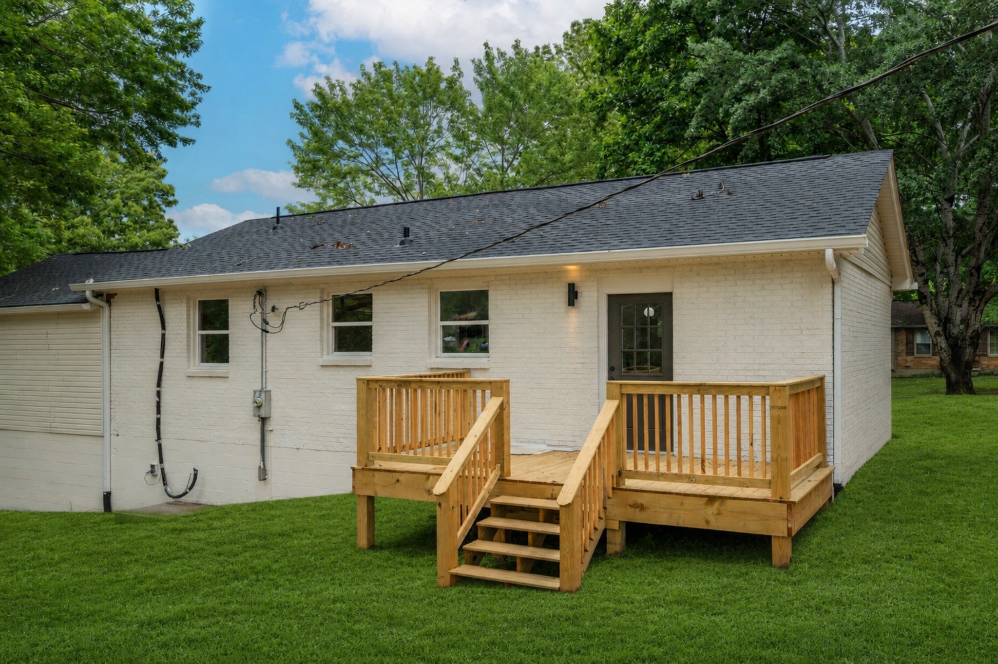 312 Bluebird Lane Dickson, TN 37055 - Photo 20 of 25 a view of a house with a backyard