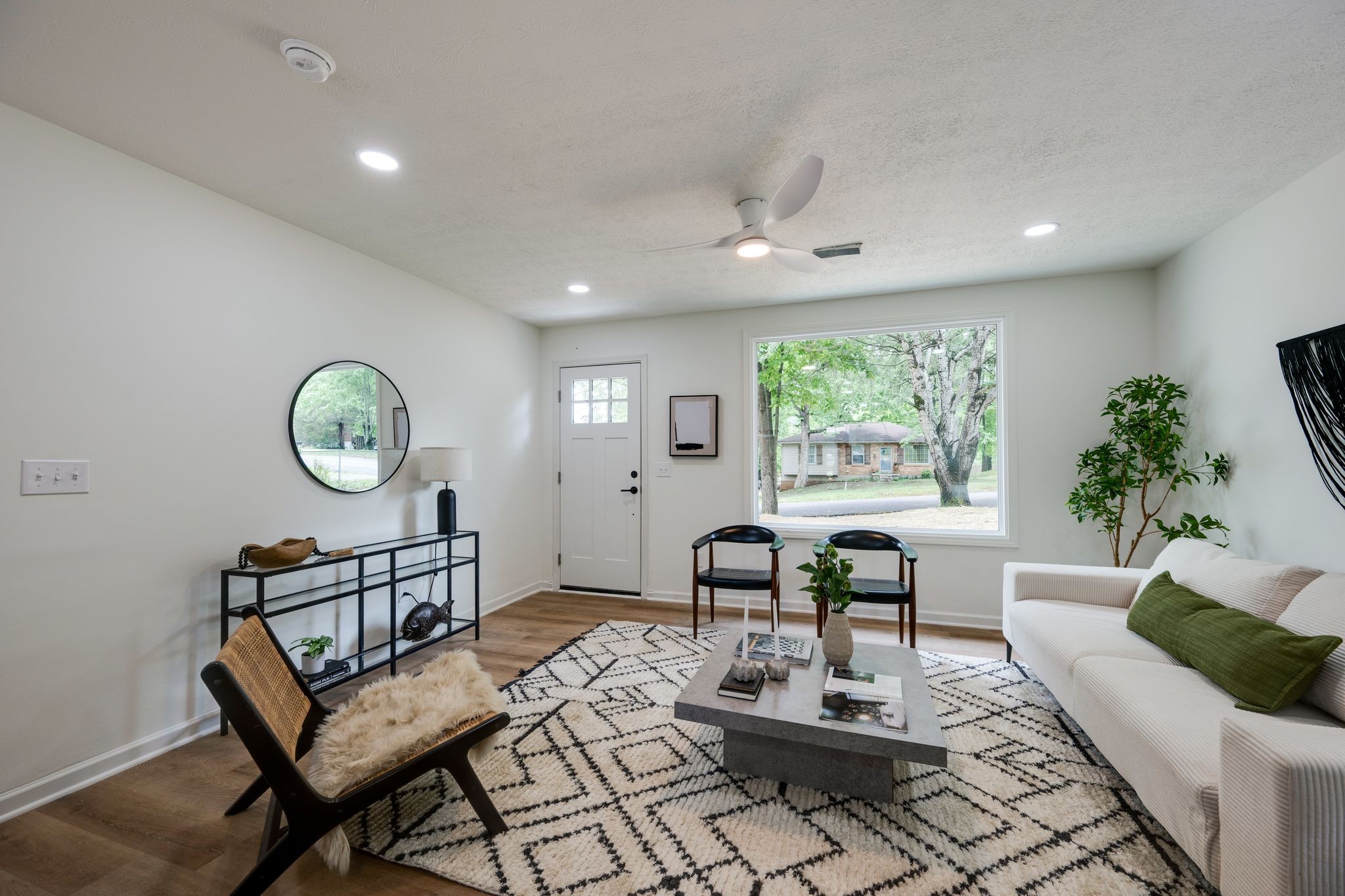 312 Bluebird Lane Dickson, TN 37055 - Photo 5 of 25 a living room with furniture a window and a potted plant