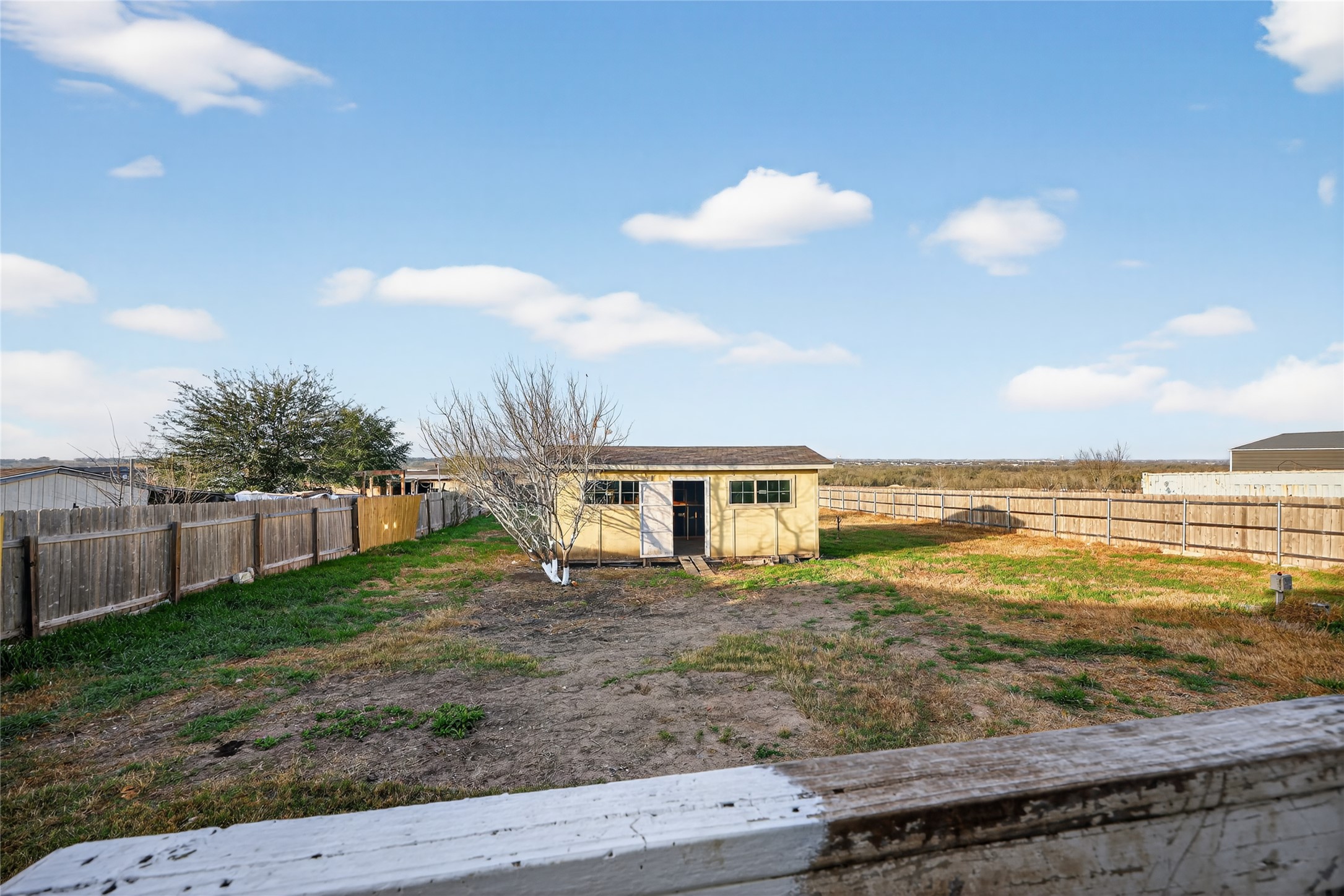 2674 Cotton Gin Road Kyle, TX 78640 - Photo 8 of 30 Fenced backyard featuring an outbuilding
