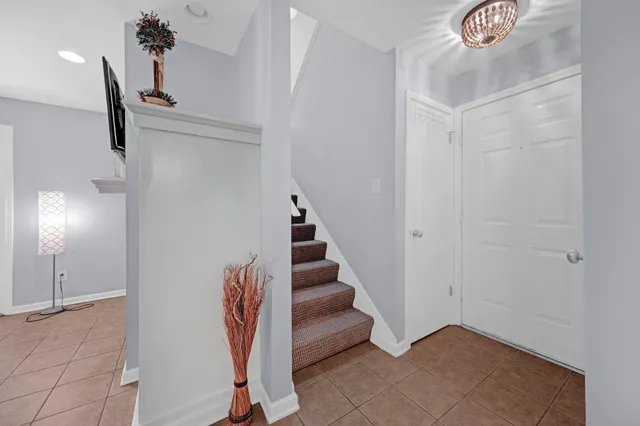 a view of entryway with stairs