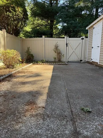 a view of backyard and yellow space