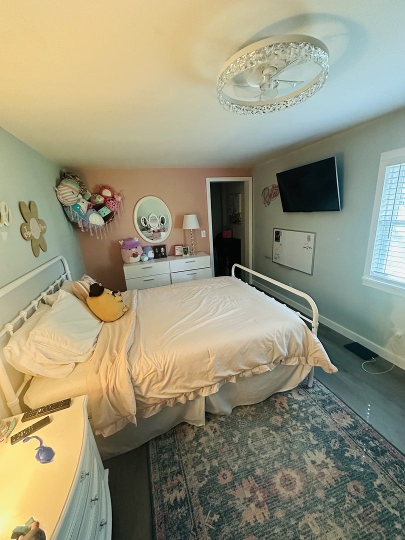 229 Broadway Street Tamaroa, IL 62888 - Photo 11 of 11 a bedroom with a bed and a flat screen tv