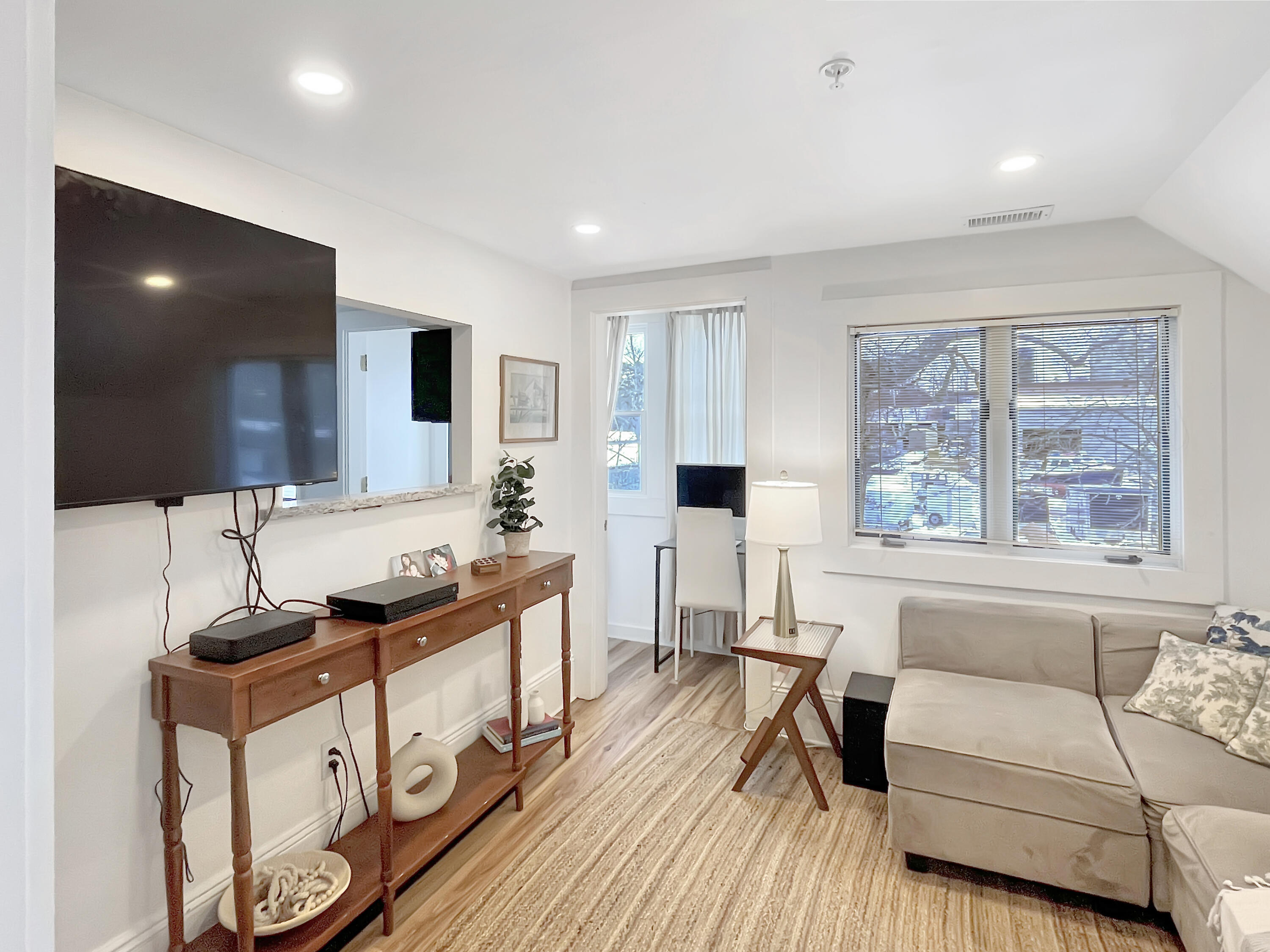 378 State Road Vineyard Haven, MA 02568 - Photo 14 of 23 a living room with furniture and a flat screen tv