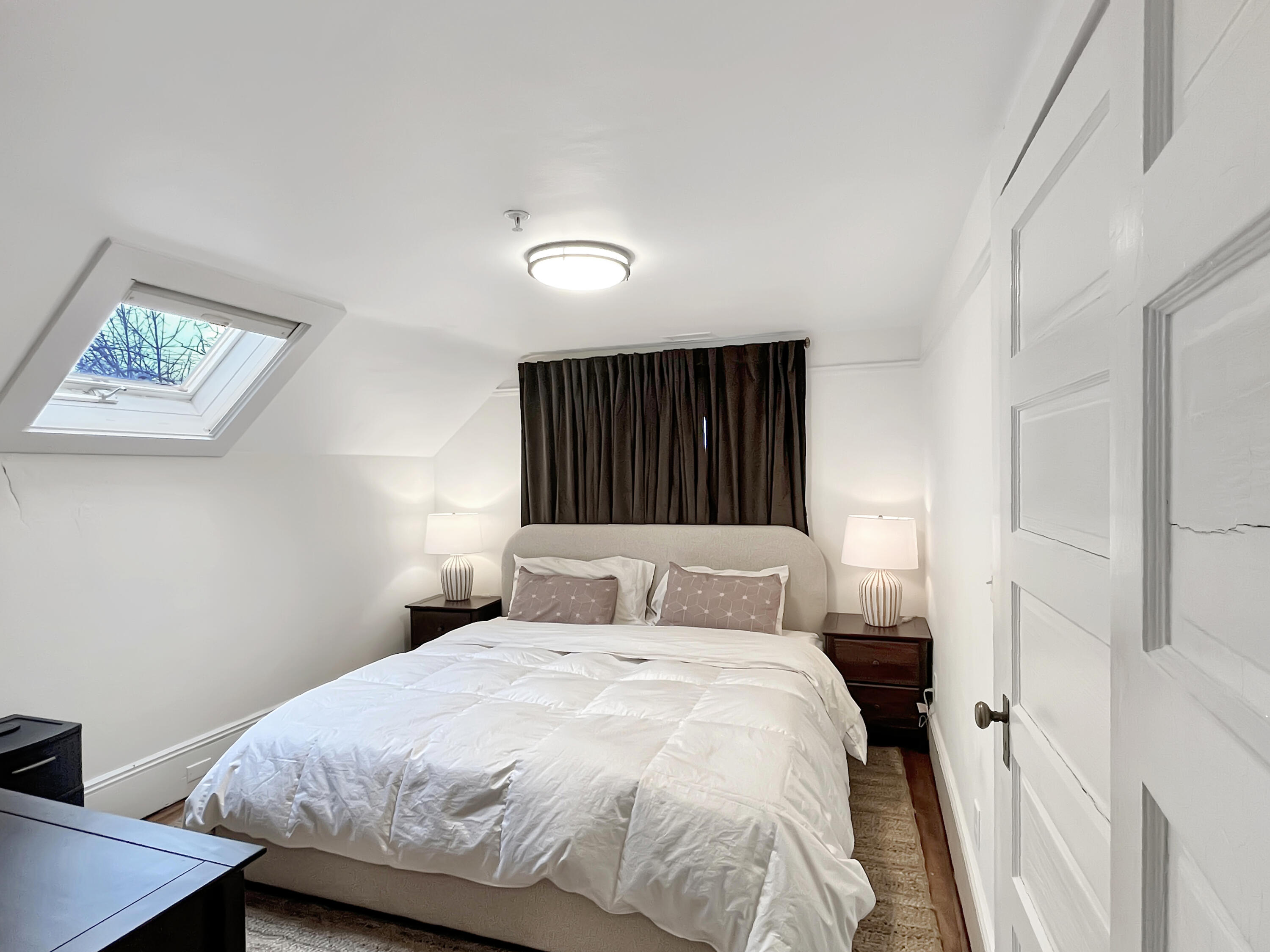 378 State Road Vineyard Haven, MA 02568 - Photo 16 of 23 a bedroom with a bed and a window