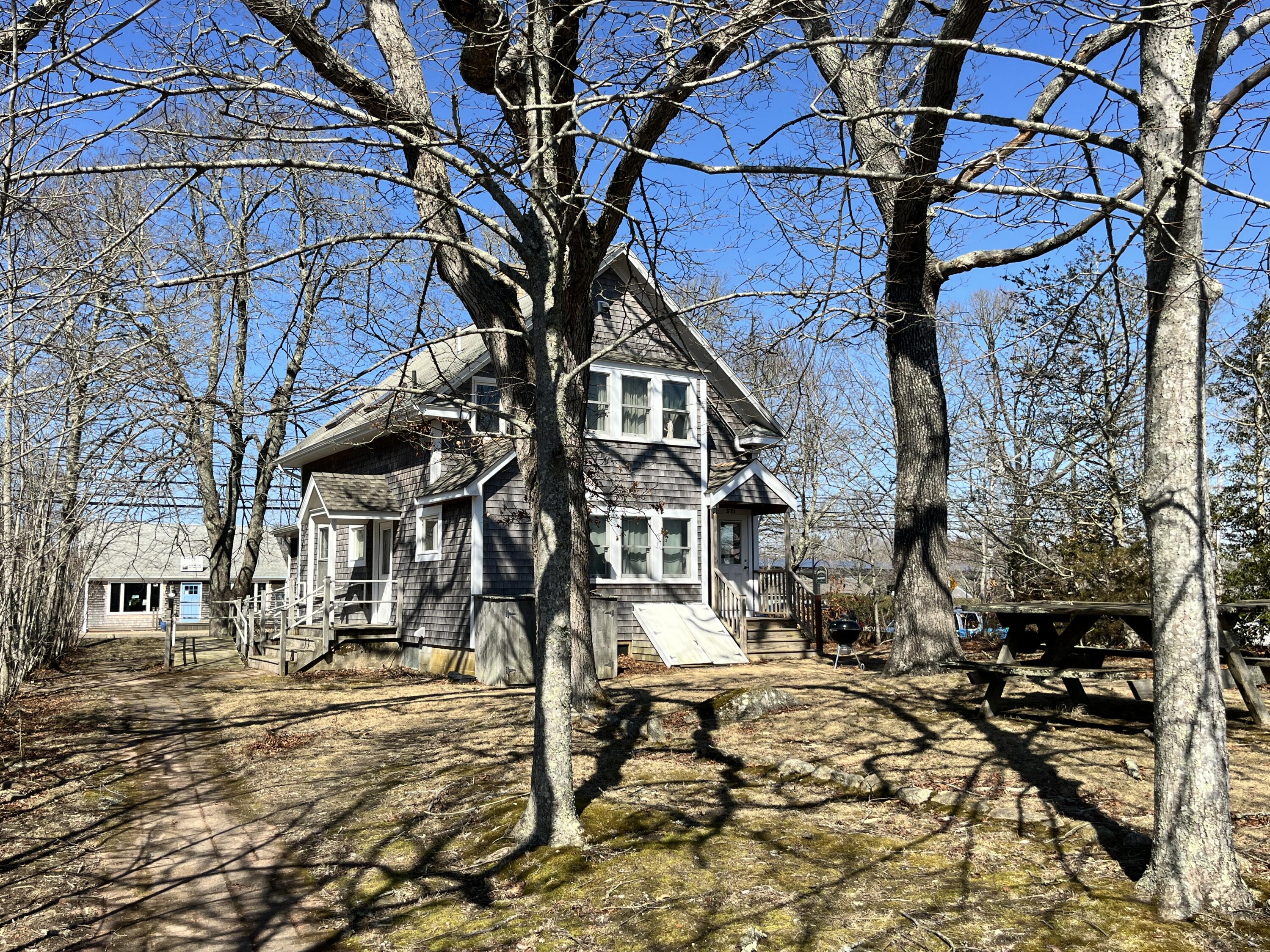 378 State Road Vineyard Haven, MA 02568 - Photo 3 of 23 a picture of street with houses