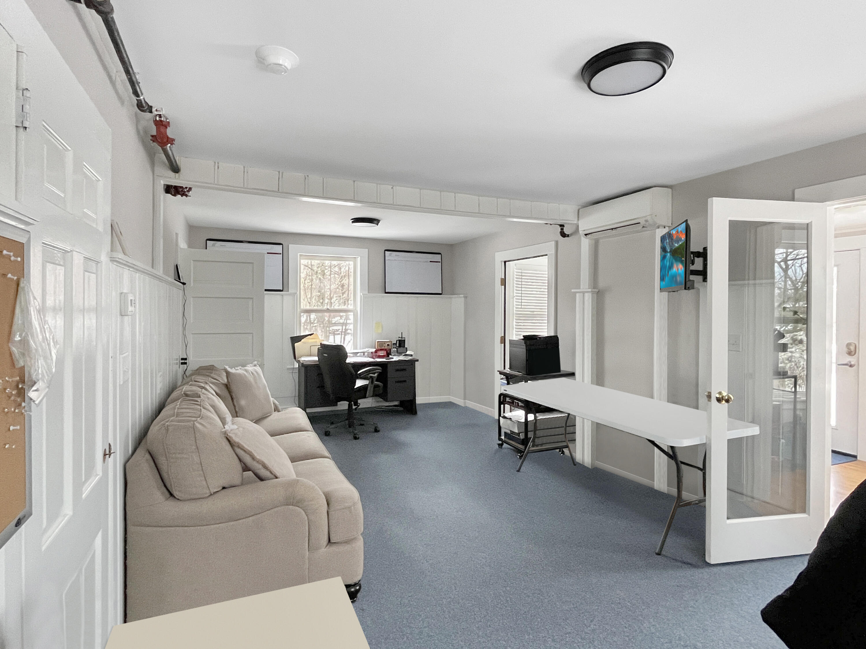 378 State Road Vineyard Haven, MA 02568 - Photo 8 of 23 a living room with furniture and a flat screen tv