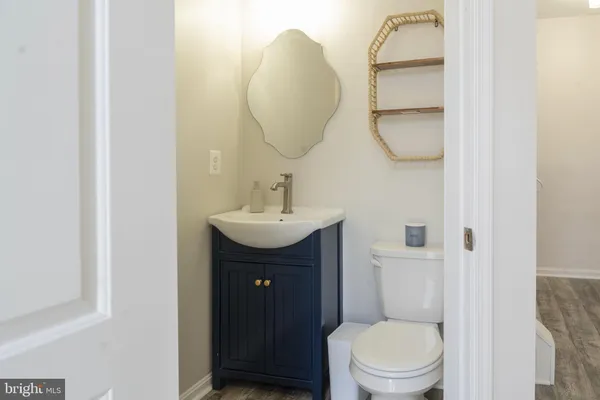 a view of a deck with a floor to ceiling window with wooden fence