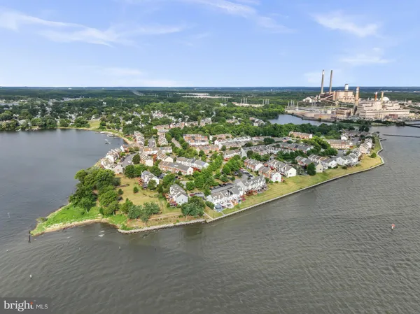 a view of a swimming pool with a lounge chair