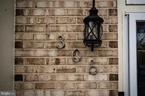 a bathroom with a mirror and a shower