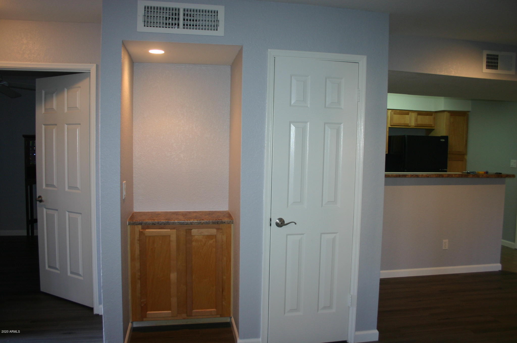 8787 East Mountain View Road, Unit 1014 Scottsdale, AZ 85258 - Photo 11 of 27 a view of bathroom with a sink and mirror