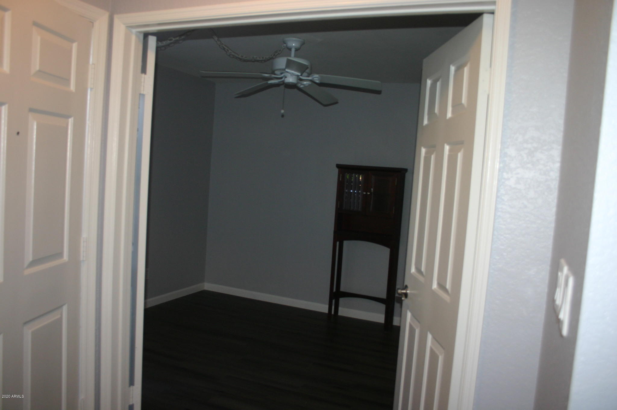 8787 East Mountain View Road, Unit 1014 Scottsdale, AZ 85258 - Photo 12 of 27 a view of a hallway with wooden floor and closet area