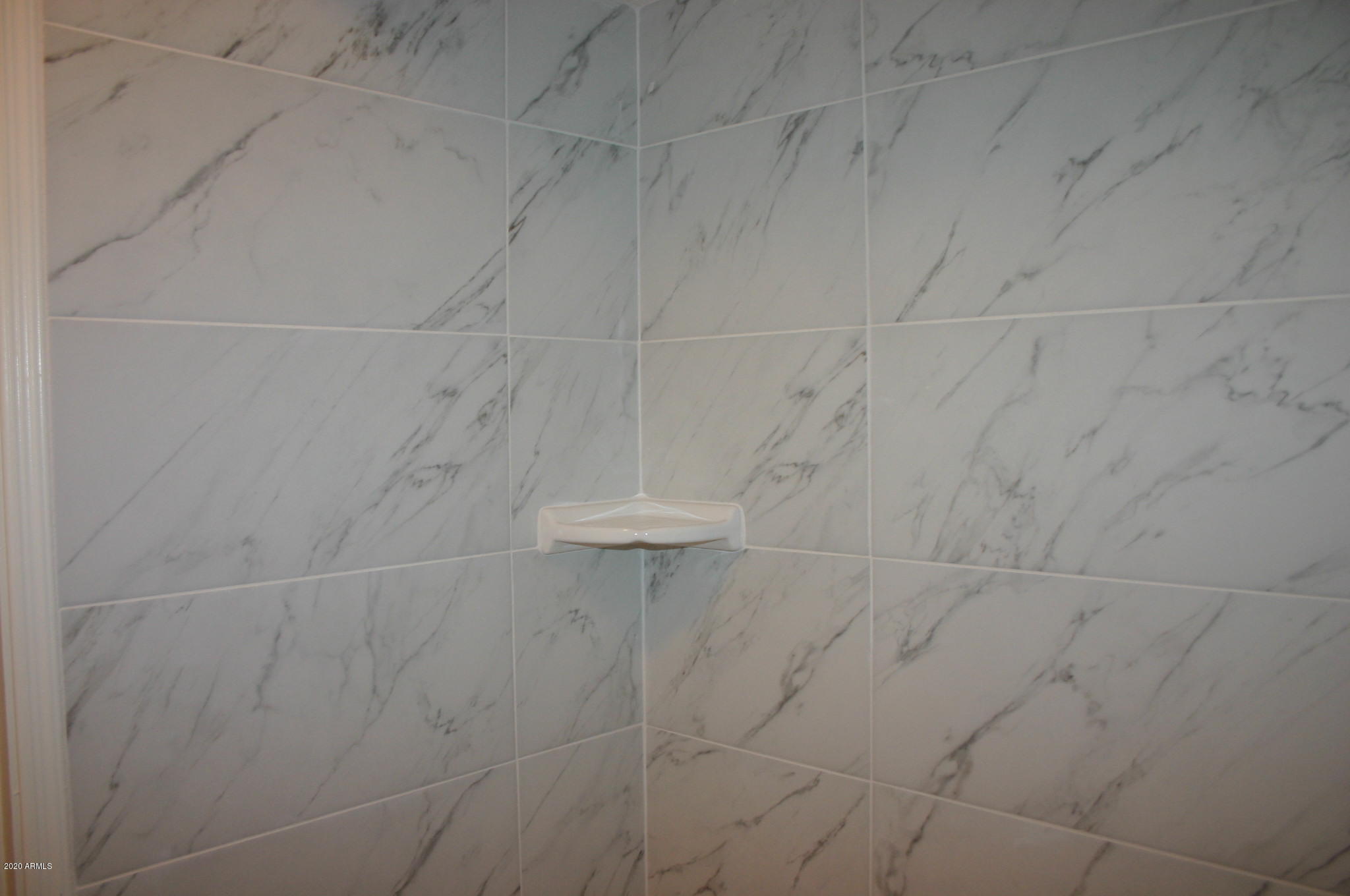 8787 East Mountain View Road, Unit 1014 Scottsdale, AZ 85258 - Photo 17 of 27 a bathroom with a shower